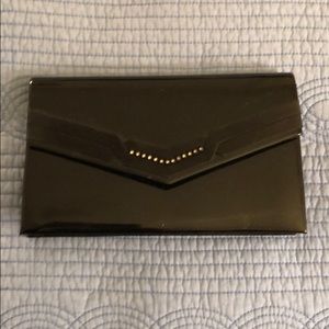 Black clutch bag with shoulder strap
